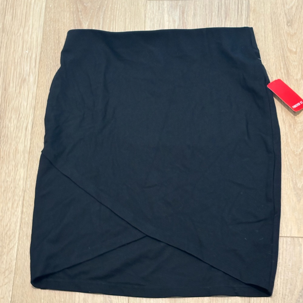 Forever 21 Black Mini Skirt, size Large (form fitting)
